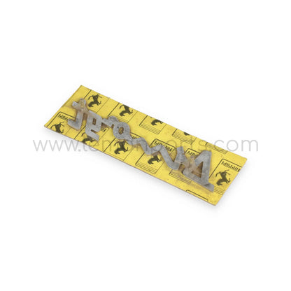 NOS Ferrari Dino GT script badge in original package for Ferrari Dino 246 GT